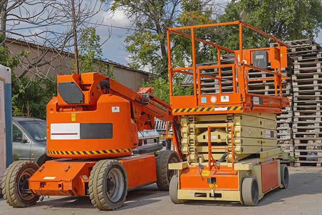 heavy-duty forklift maneuvering through a busy warehouse in Alton TX